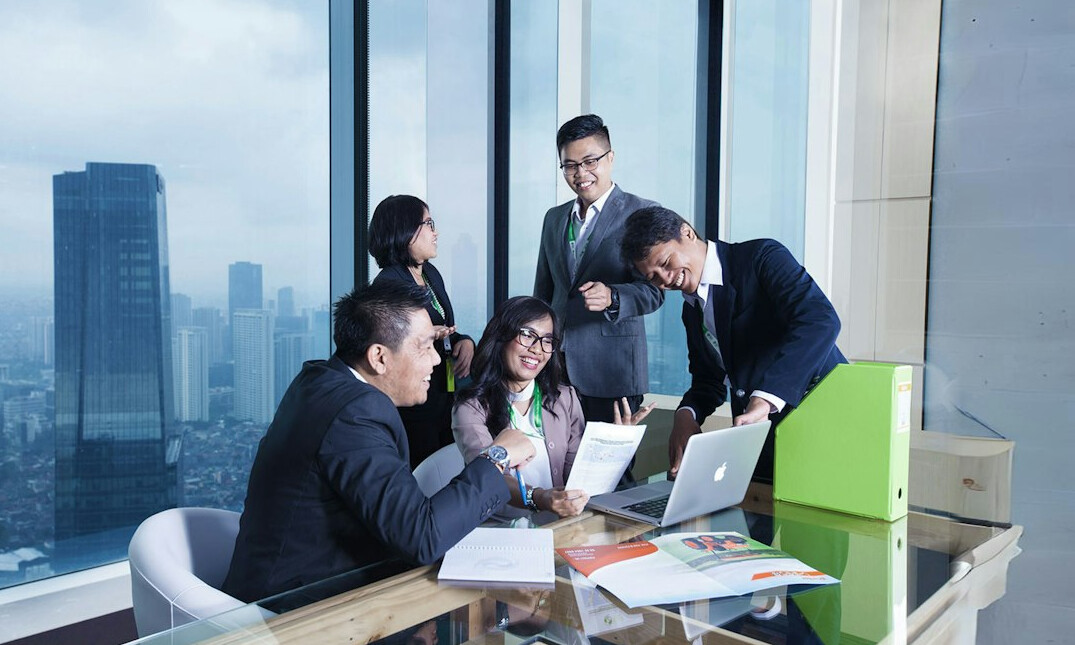 team meeting discussing business strategy